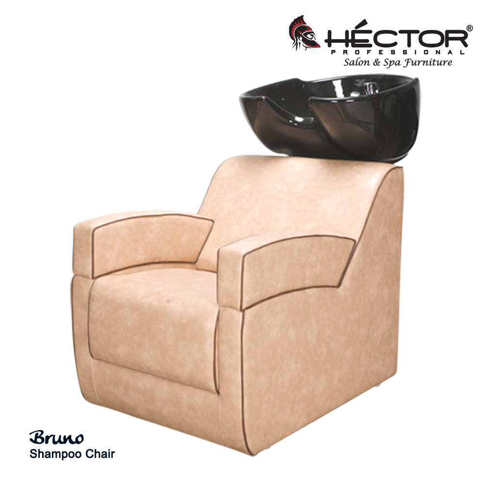 Bruno Shampoo Station An angled view of the Héctor Professional Bruno Shampoo station showcasing its plush, beige leatherette upholstery with contrasting dark brown piping.