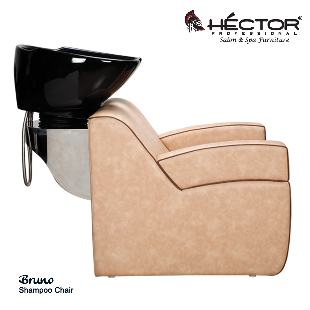 Bruno Shampoo Station An angled view of the Héctor Professional Bruno Shampoo station showcasing its plush beige leatherette upholstery with contrasting dark brown piping.