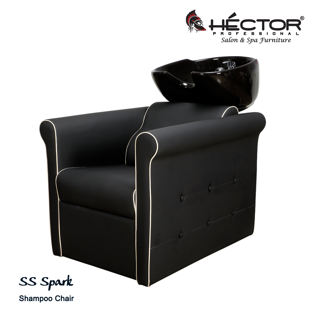 Side view of Hector Professional SS Spirit shampoo chair with deep blue leatherette upholstery, light grey diamond-quilted side panels, and an integrated black ceramic basin with extendable leg rest.