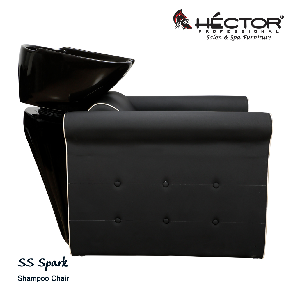 Perspective view of the Hector Professional SS Spark shampoo chair in matte black with white piping, button-tufted side panels, and a large black ceramic basin.